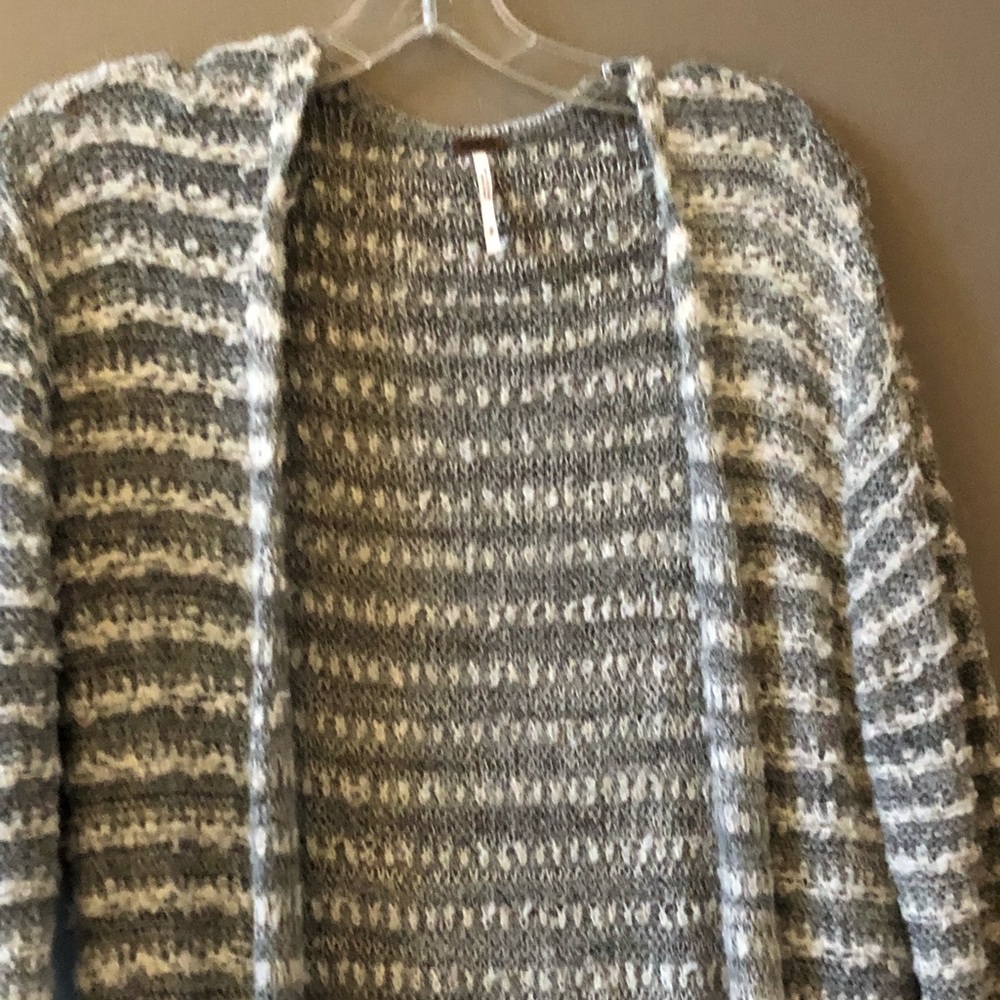 Free People Woman’s size small long sweater.